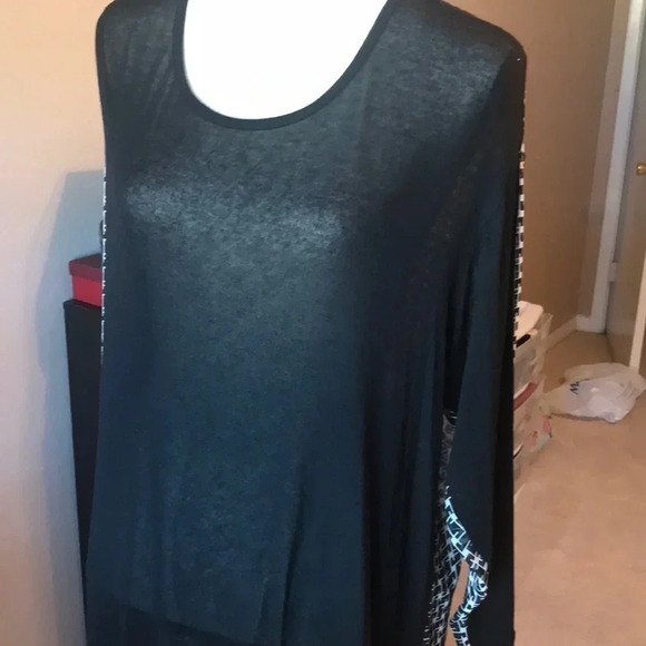 Cool black and white long sleeves top. From - Picture 6 of 7